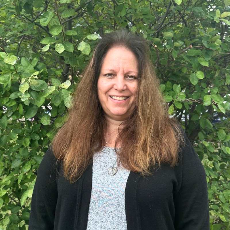 Lisa Thompson Senior Director of Programs and Marketing Smiling